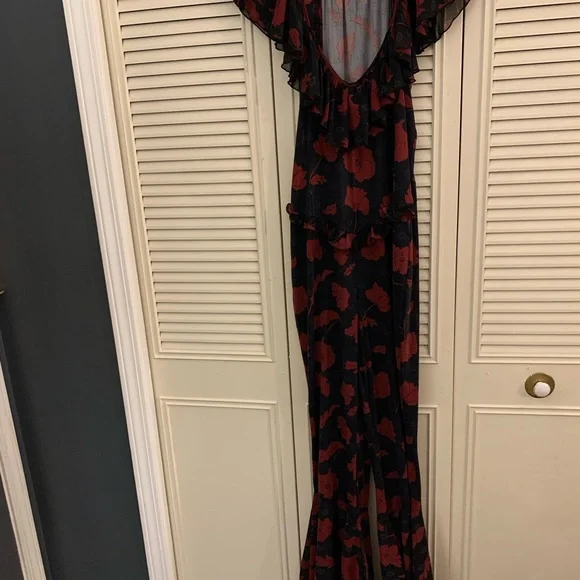 Free People Austyn one piece floral, ruffle, bell bottom jumpsuit. - Picture 4 of 5